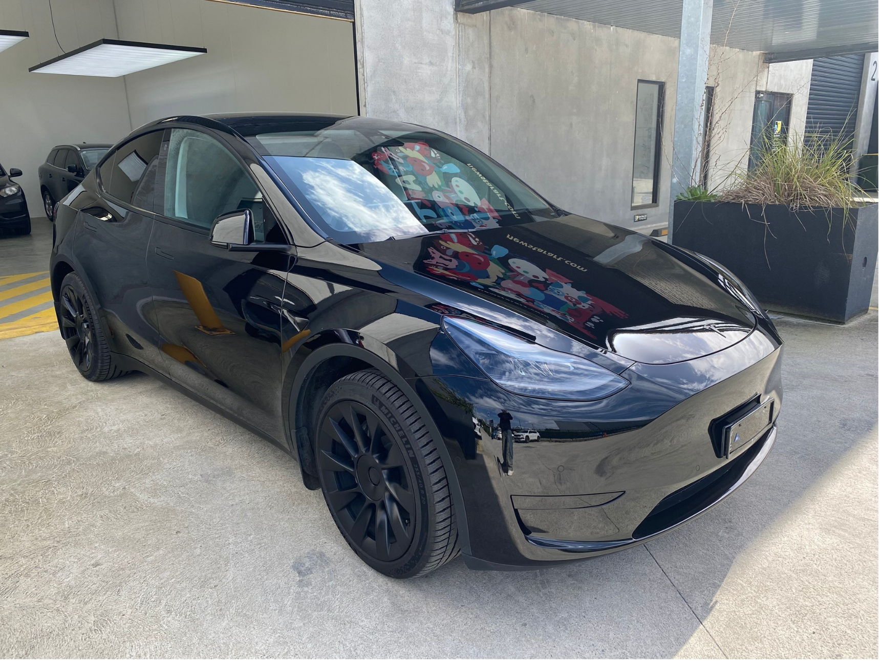 Tesla vehicle after accident repair at Box Hill Accident Repair Centre