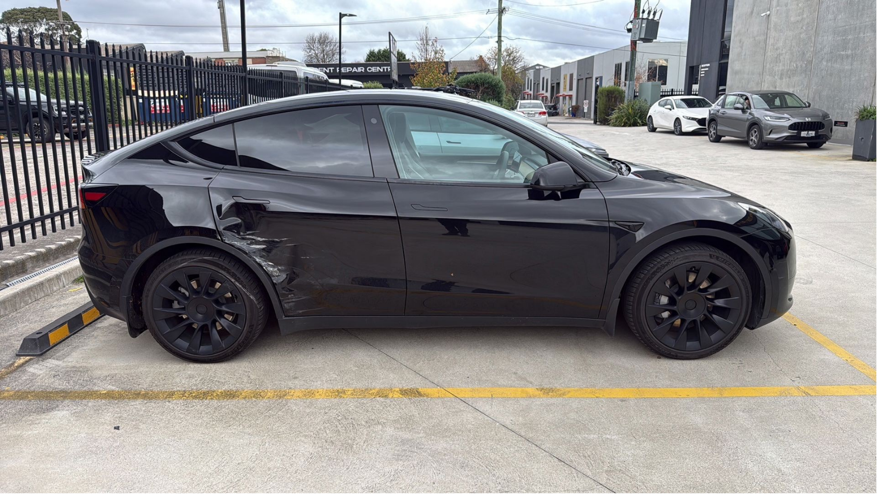 Tesla accident damage before repairs at Box Hill Accident Repair Centre